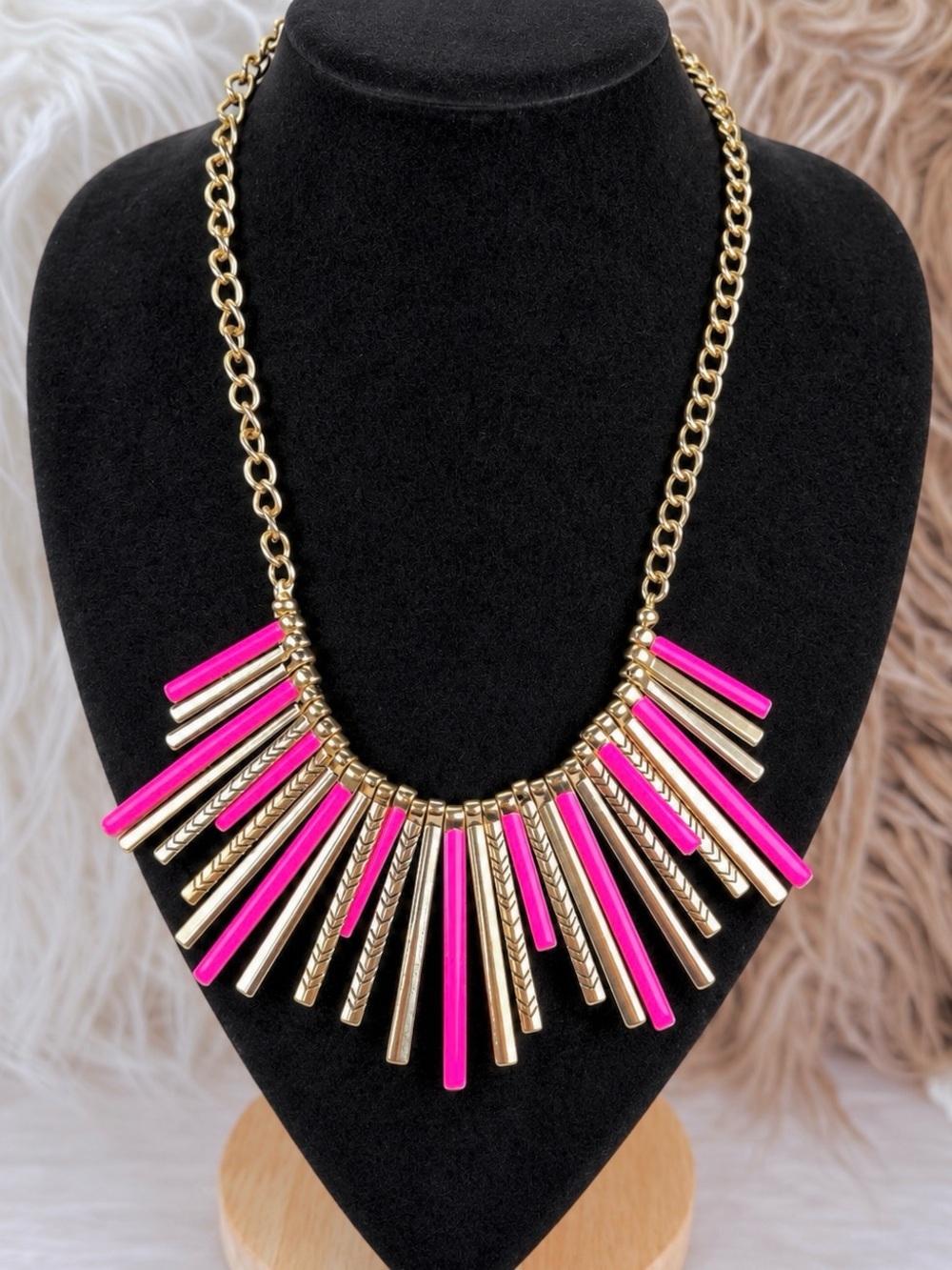 Pretty goldtone, pink enamel, metal fringe statement necklace